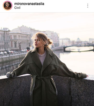 jesenske foto ideje za instagram - dekle na mostu v plašču